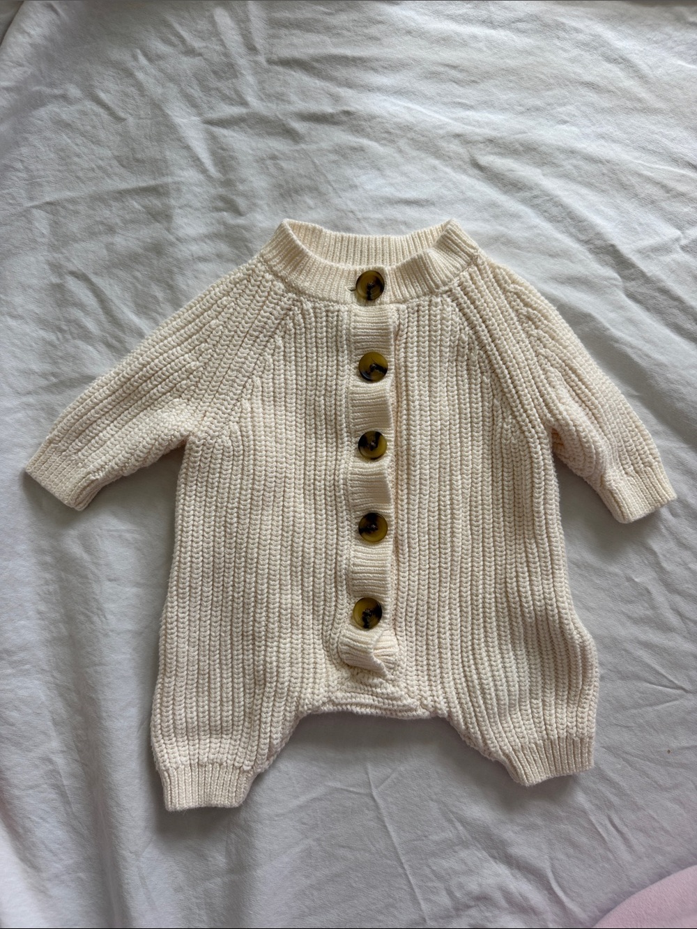 Amazon Essentials x Sofia Grainge Cream Knit Button Baby One-Piece Footie